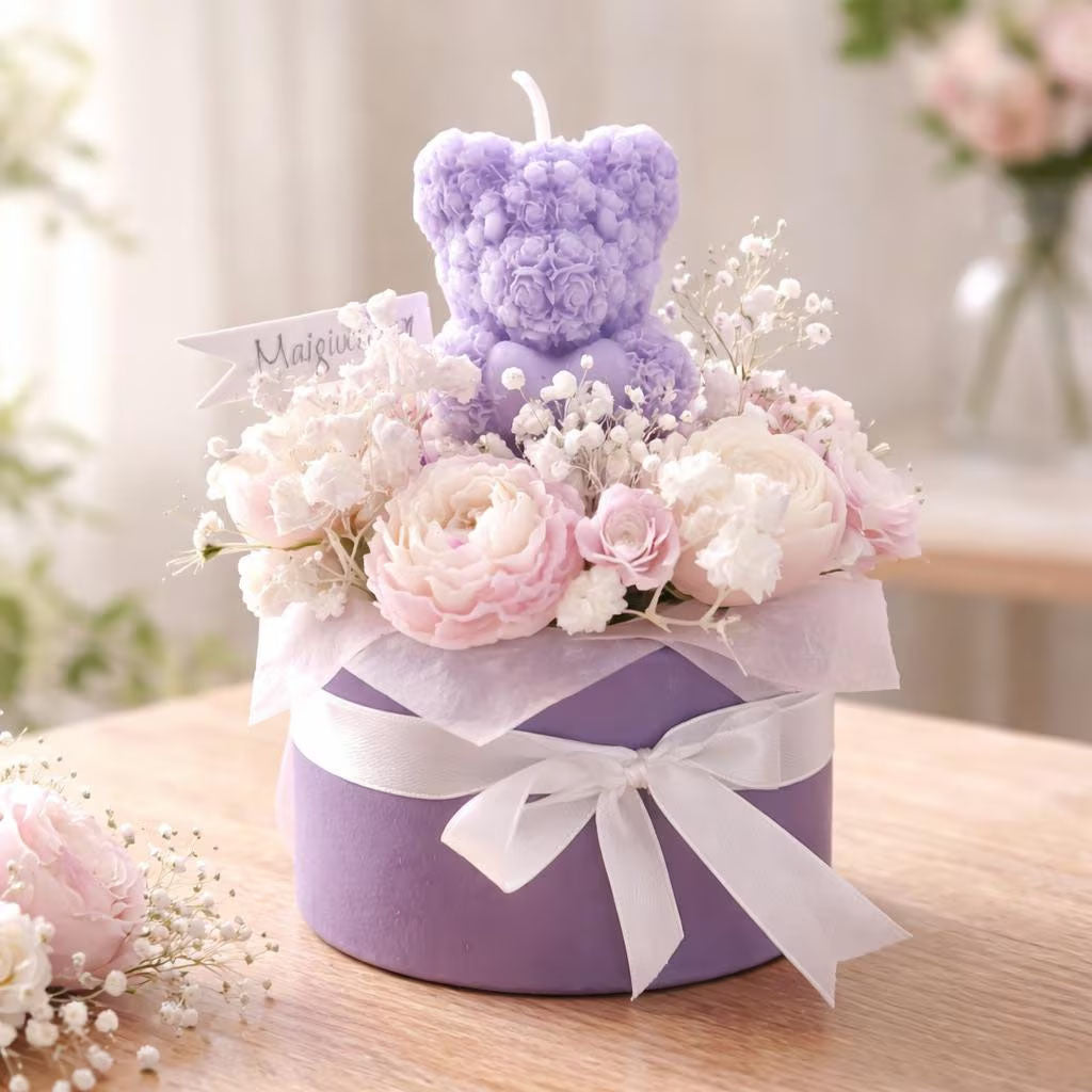 kleines Blumenbouquet aus Kerzen mit Teddy