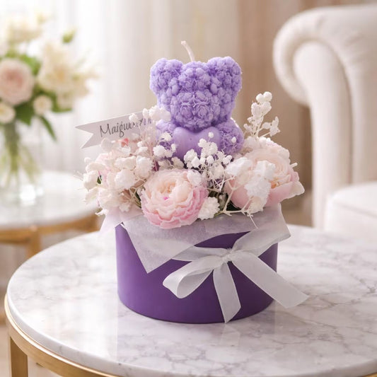 kleines Blumenbouquet aus Kerzen mit Teddy